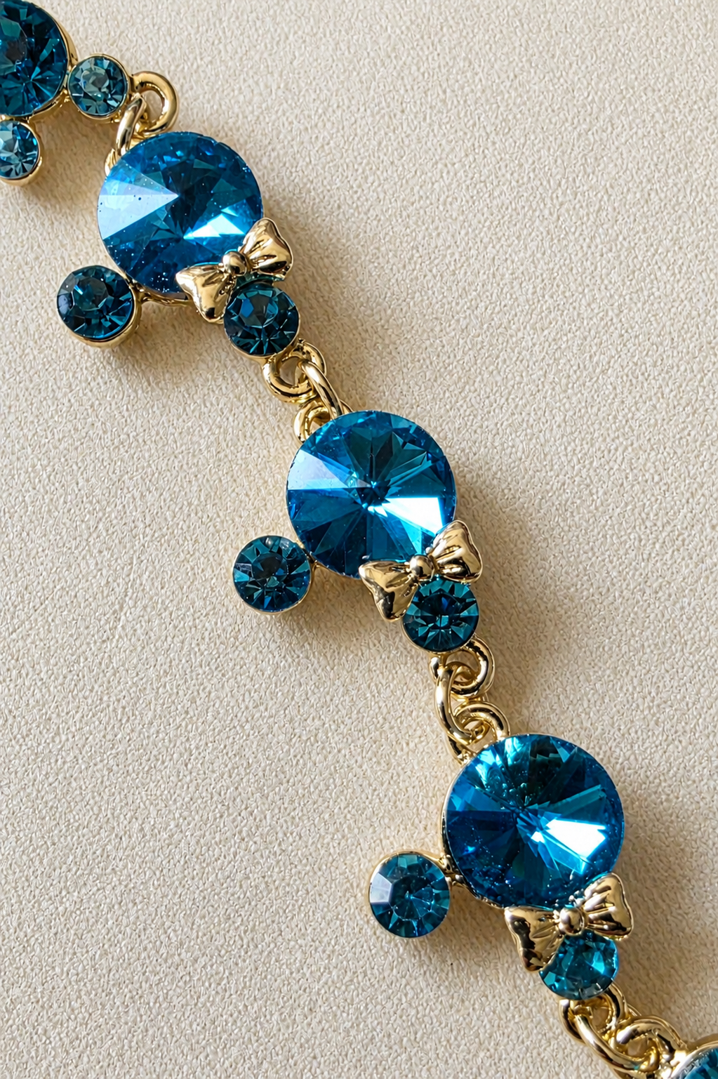 14K Gold Filled & Blue Crystal Charm Bracelet – Elegant Floral Cluster Design