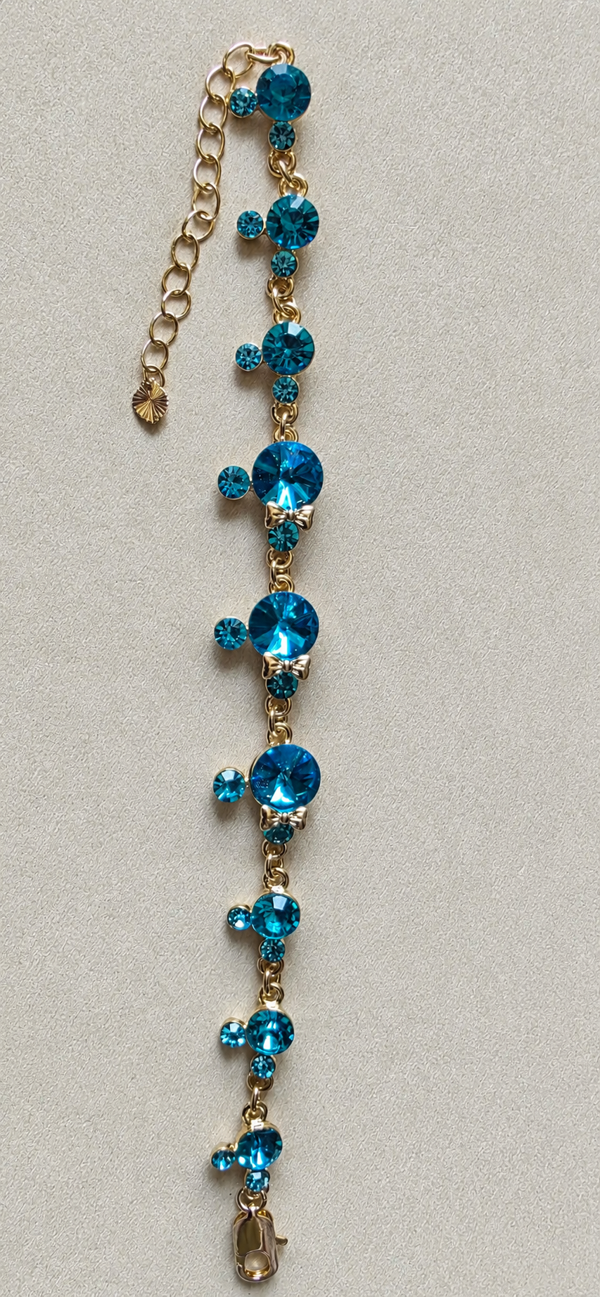 14K Gold Filled & Blue Crystal Charm Bracelet – Elegant Floral Cluster Design